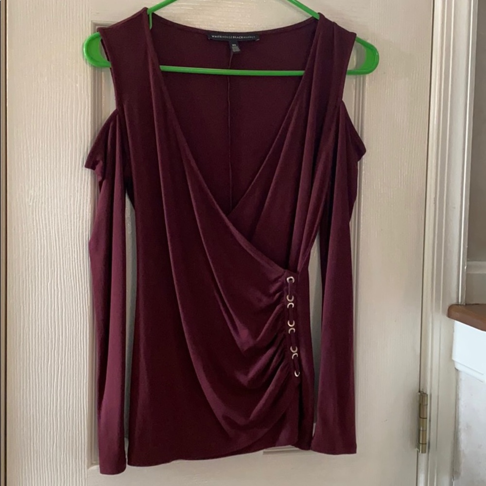 Burgundy cold shoulder top with grommet detail